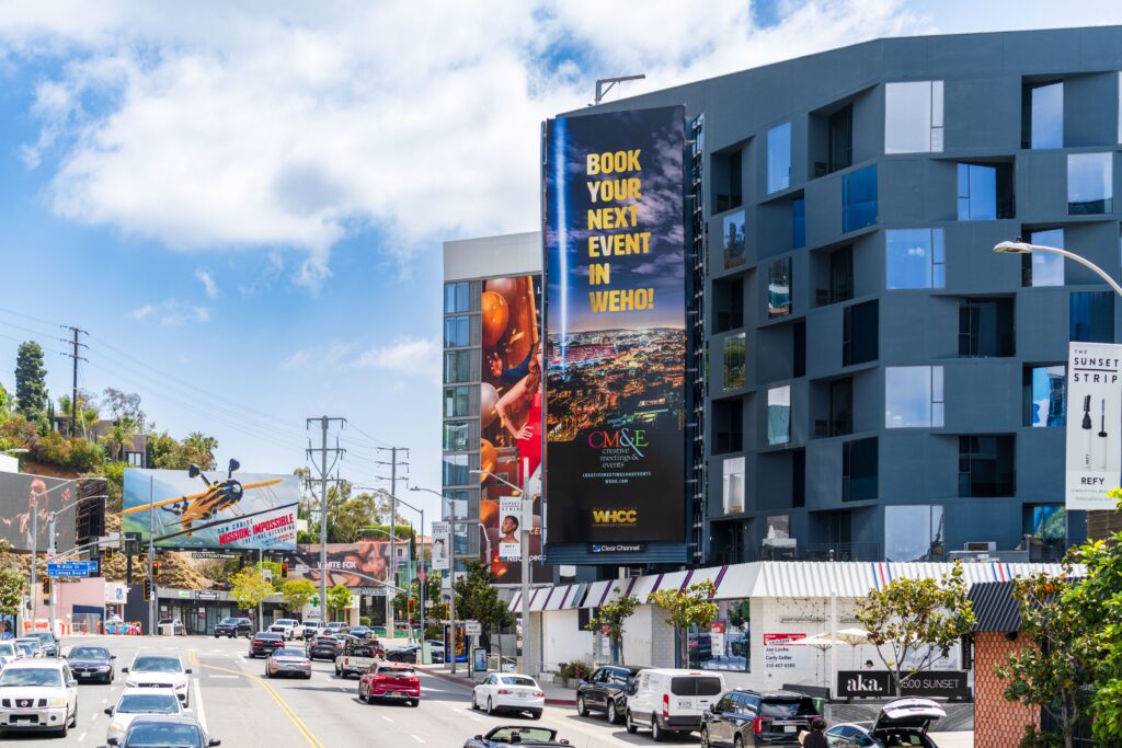 West Hollywood street with modern building billboard