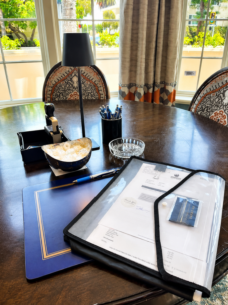 Home office desk with documents and stationery