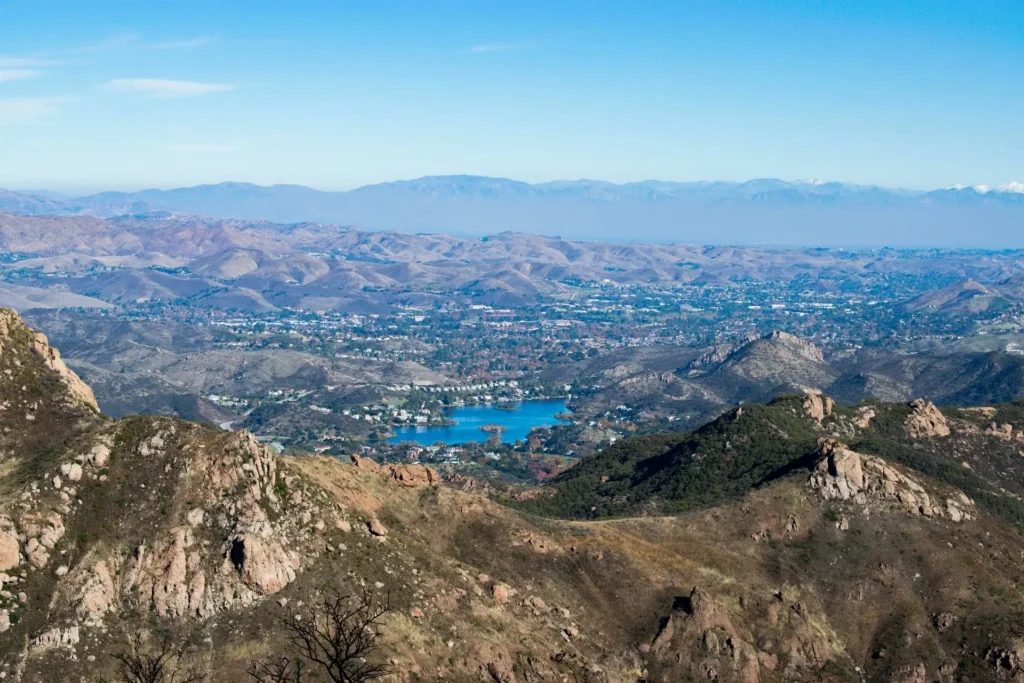 Aerial view of lake in mountainous valley town